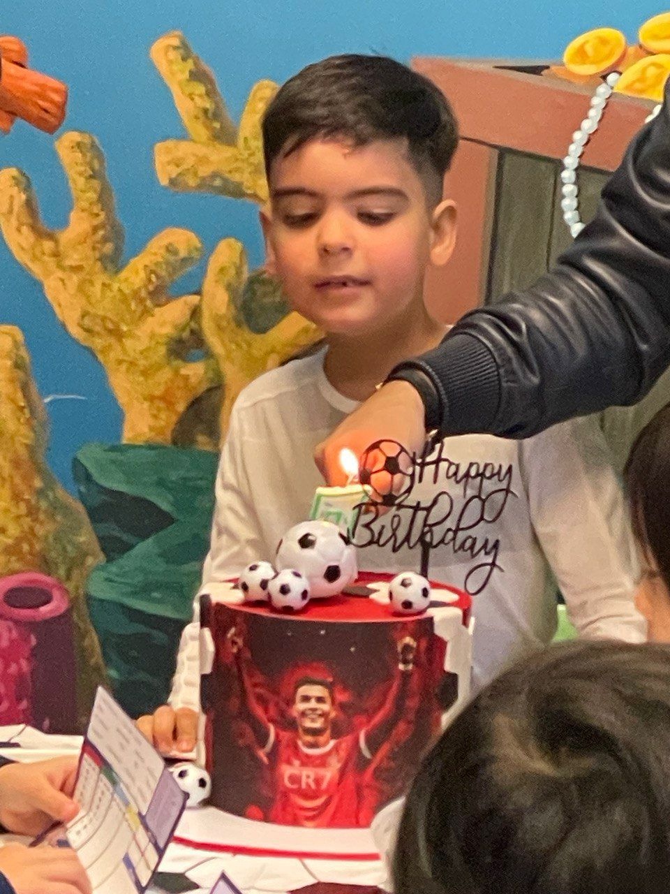 Birthday boy with his cake at Lazer Runner
